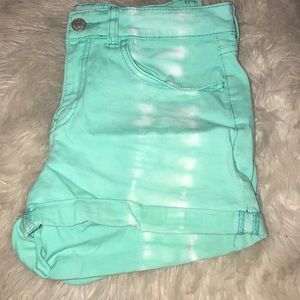 Sea green colored shorts